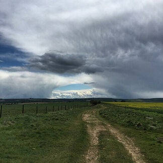 West-kennet-oasis-of-blue-sky-appears-in-the-midst-of-a-storm-1 1 